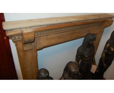A Victorian pine fire surround; together with another similar (2) 