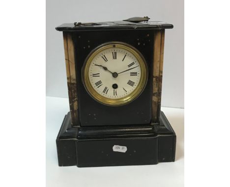 A circa 1900 marble and black slate cased mantle clock, the 30 hour French movement with enamel dial and Roman Numerals, 22cm