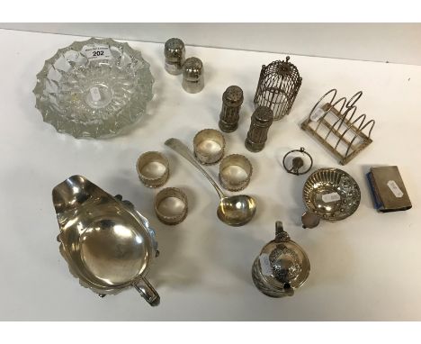 A collection of small silver and plated wares to include a Victorian silver cylindrical lidded mustard with wrythen and embos