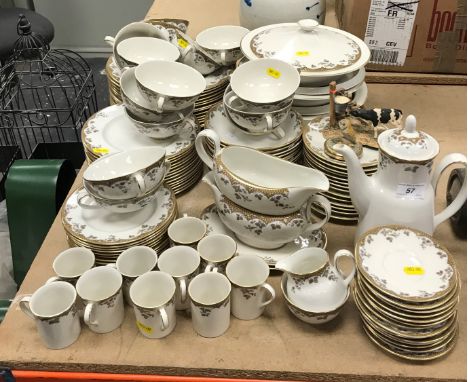 A Royal Doulton "Lynnewood" part dinner service comprising three tureens with lids, an oval serving plate, two sauceboats and