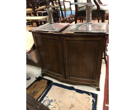 A circa 1900 mahogany bow fronted two door cupboard with single shelf, raised on splayed bracket feet, 122 cm wide x 57 cm de