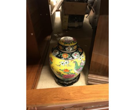 A collection of items to include a modern famille-jaune style Japanese ginger jar, a walnut cased mantel clock, various vinta