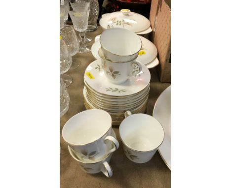 A Royal Doulton "Yorkshire Rose" dinner and tea service, circa 1977 comprising two tureens and lids, seven teacups and eight 