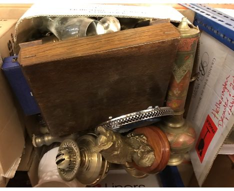 A box of metalwares to included brass candlesticks, a brass owl ornament, oil lamp etc.