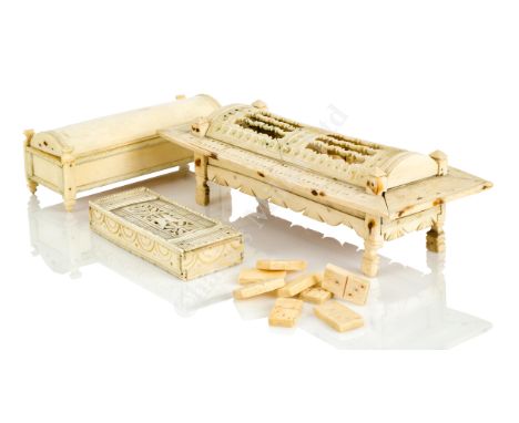 AN EARLY 19TH CENTURY FRENCH NAPLEONIC PRISONER-OF-WAR BONE DOMINO COFFER, CIRCA 1800 with fret-cut hinged dome top to domino