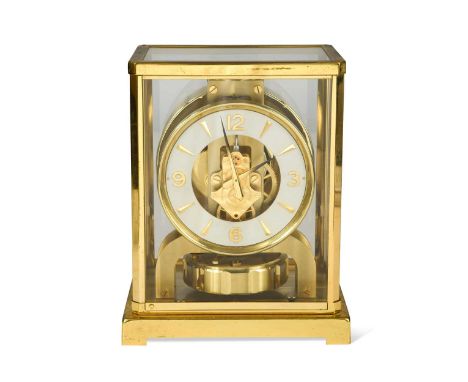 A Jaeger LeCoultre Atmos clock,  serial no. 151851, the white chapter ring with Arabic quarter numerals, in typical lacquered