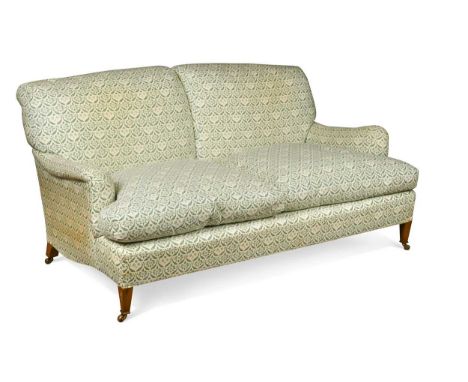 A 'Howard & Son' two seater sofa by Lenygon & Morant, late 20th century, upholstered in an H&amp;S monogrammed green and whit