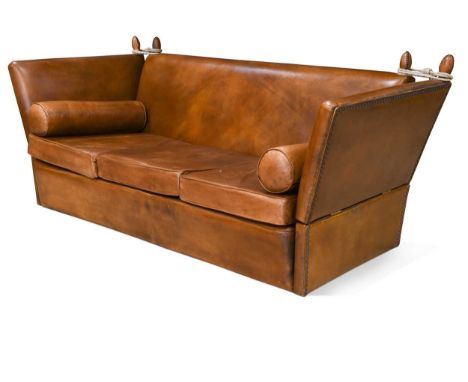 A large three-seater Knole type leather sofa, modern, with drop ends and three squab cushions upholstered in tan leather98 x 