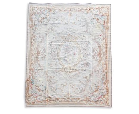 A large Aubusson-style tapestry, 20th century,  worked in polychrome threads of blue and pink, the central spray of roses set