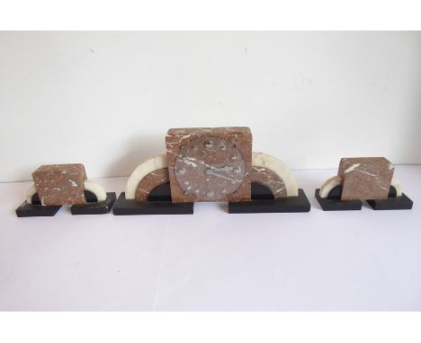 A French Art Deco-period marble mantel clock garniture, the convex circular perspex dial surrounding circular markers, togeth