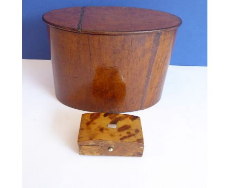 A Regency oval tea caddy and a small 19th century tortoiseshell trinket box (2)