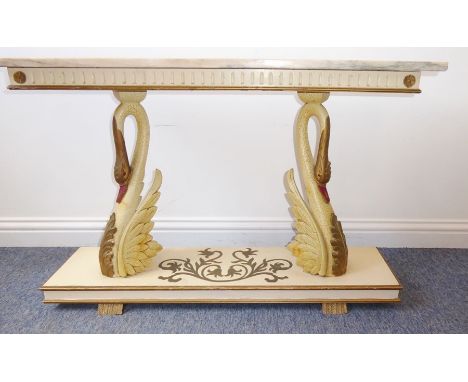 An unusual French marble-topped console table, the rectangular marble above two supports modelled as swans, (107cm wide x 32c