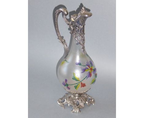 A 19th century style (reproduction) baluster-shaped glass decanter etched with coloured flowers in relief, with silver-plated