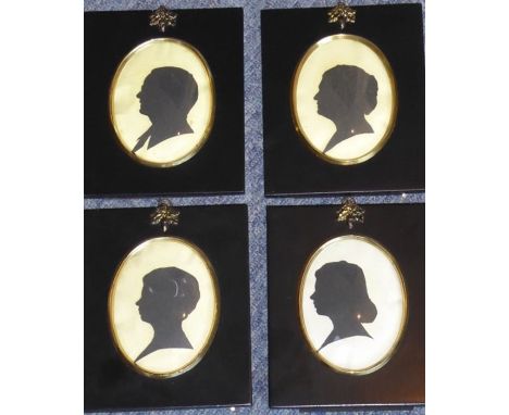 Four ebonised framed oval silhouette portrait miniatures (modern)
