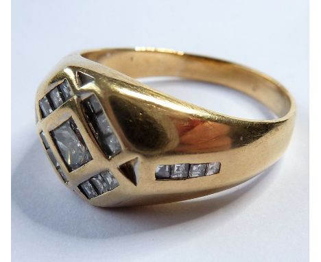 A gentleman's 18-carat gold ring set with 20 princess-cut diamonds (approx. 1.2 carat)
(The cost of&nbsp;UK postage&nbsp;via 