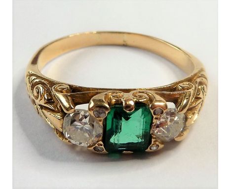 An 18-carat gold ring set with an emerald and two diamonds
(The cost of&nbsp;UK postage&nbsp;via Royal Mail Special Delivery 