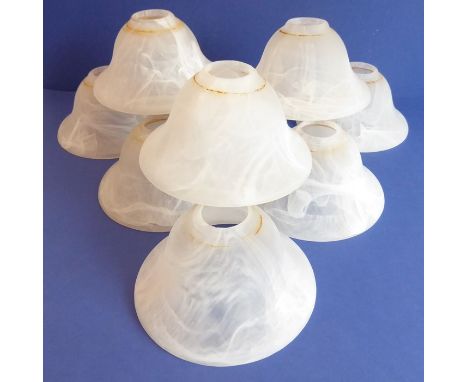 Nine bell-shaped alabaster-style glass light shades