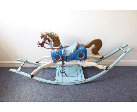 An original 1950s/1960s fairground carousel horse 'Alexander'; with brightly coloured paintwork, carved saddle, circular mirr