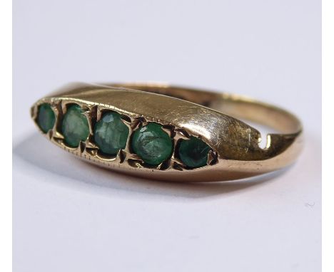 A 9-carat gold ring set with five graduated emeralds
(The cost of&nbsp;UK postage&nbsp;via Royal Mail Special Delivery for th