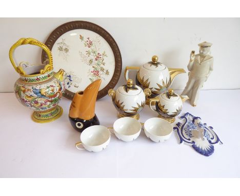 Various ceramics including a striking Limoges tea service comprising teapot, two-handled sucrier, lidded creamer and three cu