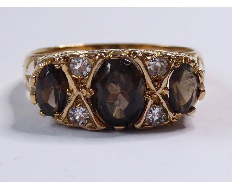 A 9-carat gold, smoky quartz and diamond dress ring, ring size N
(The cost of&nbsp;UK postage&nbsp;via Royal Mail Special Del