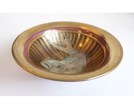 A lustreware bowl decorated with a large fish amongst gilding; the underside monogrammed MBH (17cm diameter)The item appears 