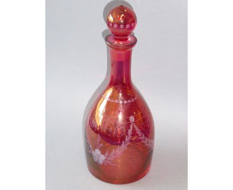 A 19th century mallet-shaped cranberry glass decanter etched with floral swags etc.(27cm high)