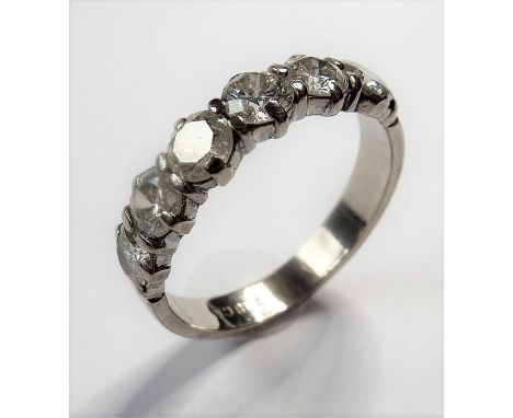 An 18-carat white-gold half-eternity ring set with six diamonds (approx. 2 carats)
(The cost of&nbsp;UK postage&nbsp;via Roya