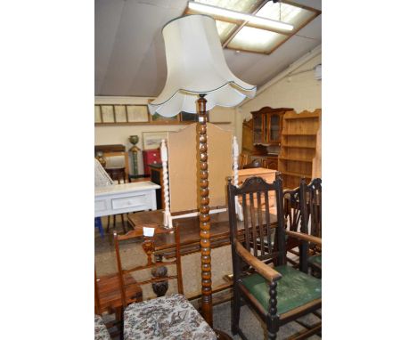 Turned wooden standard lamp