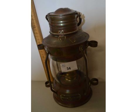A vintage Simpson Lawrence copper mounted ships lamp