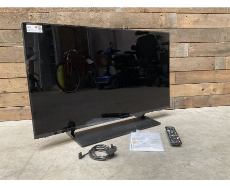 Panasonic TX-40GX800B 4K 40" television with remote and manual