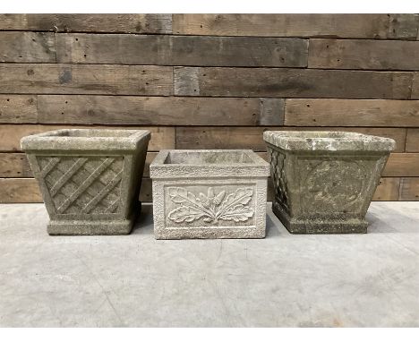Pair of square cast stone planters, single planter with leaf decoration and a rectangular brick effect planter (4)
