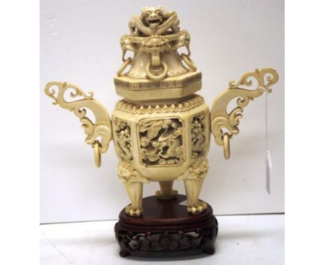 Good antique Chinese carved ivory lidded urn on timber stand, intricately carved dragon form to lid, and deeply carved figure