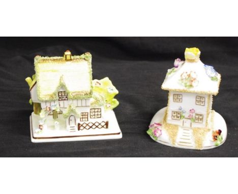 Two vintage Coalport ceramic pastille burners each in the form of a 2 level English house, (height 11cm approx, each).