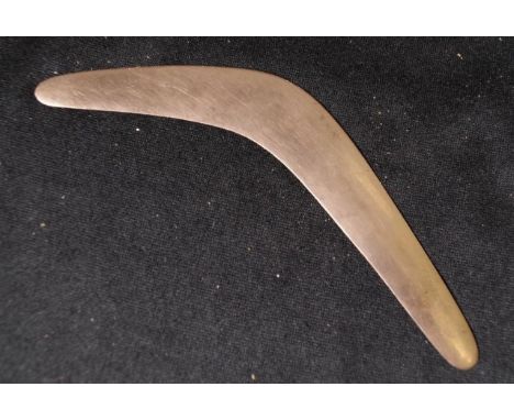 Vintage rose gold boomerang souvenir marked 9 carat, for Hardy Brothers, (length 14cm approx; weight 23 grams approx).
