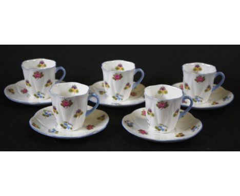 Five Shelley dainty coffee cups &amp; saucers blossom decorated, marked to bases and # J414.