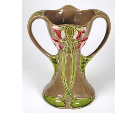 Good Austrian Art Nouveau ceramic vase Julius Dresser embossed floral decoration, dual handled, marked to base and # 92940, (