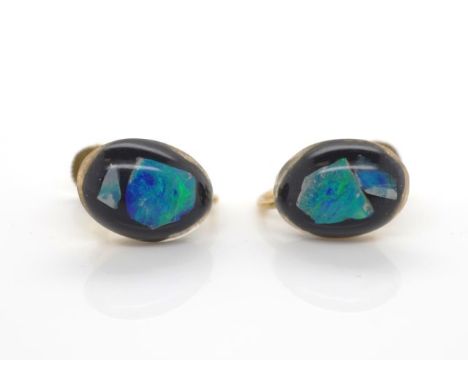 Opal triplet and 9ct yellow gold earrings marked 9k to screw backs.