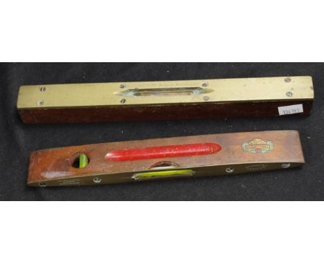 Two various vintage English levels including metal and wood based, Underhill, Manchester level, (length 25cm approx); and met