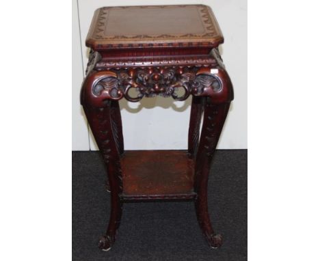 Chinese 2 tier table stand extensive carving to top, apron, lower shelf, and legs, (height 76cm, width 42cm approx).