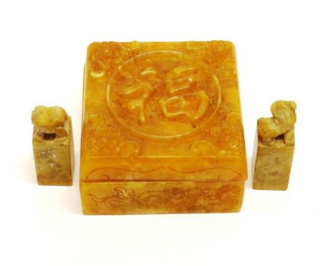 Chinese carved yellow stone seal box carved figures and script to cover, enclosing pair seals, with carved finials, (box, 7.5