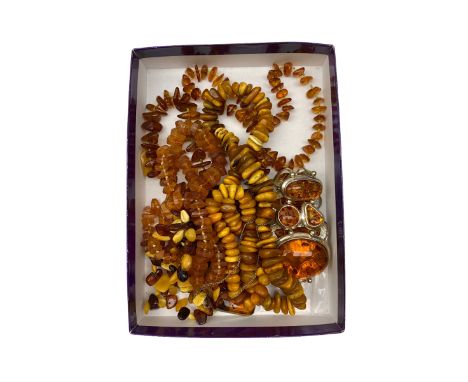 Amber jewellery, including amber chip bead necklaces, an amber bracelet and an amber pendant on chain