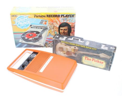 Late 1970s novelty 'The Picker' guitar transistor radio, boxed; together with a Taiyo BBC Junior Choice portable record playe