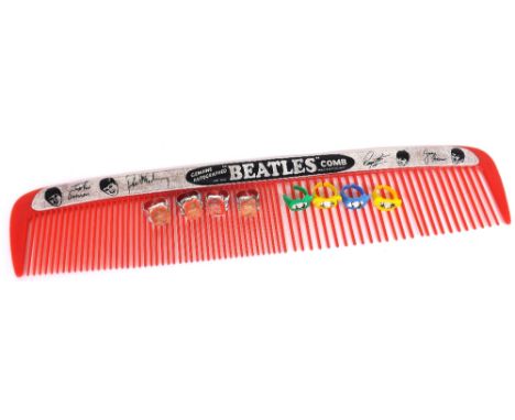 The Beatles - set of four original flasher rings; together with four plastic rings and a Beatles comb