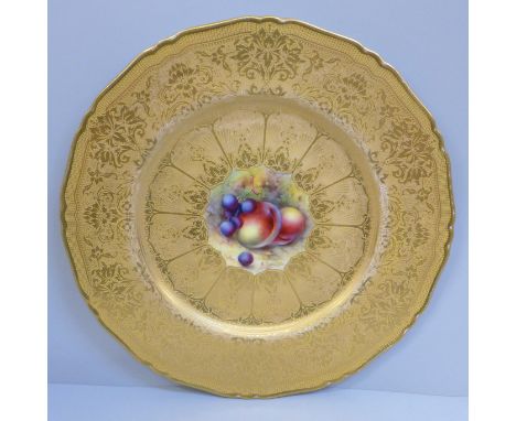 A Royal Worcester gold cabinet plate with central still life painting of fruit, signed E. Townsend 