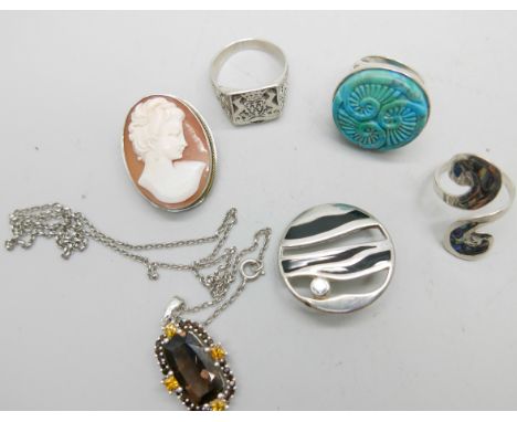 A silver and turquoise ring, a silver stone set pendant, and a silver and enamel brooch, together with a .800 silver and abal