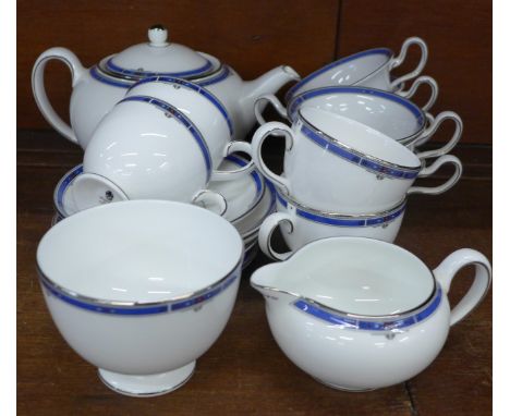A Wedgwood Kingsbridge part tea set, tea pot, six tea cups, four coffee cups and saucers, cream, sugar and tea plate 