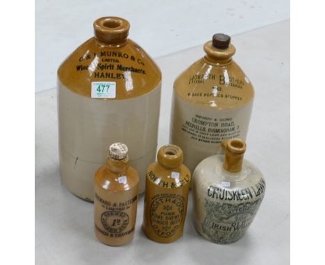 Five ceramic bottles to include: G &amp; J Munro &amp; co Hanley, Howarth Brothers's Birmingham, Steward &amp; Patterson Norw