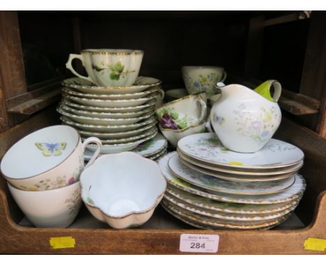 A Seltmann Weiden Bavaria tea service, with spring flower design, and an early 20th century part tea service with painted flo