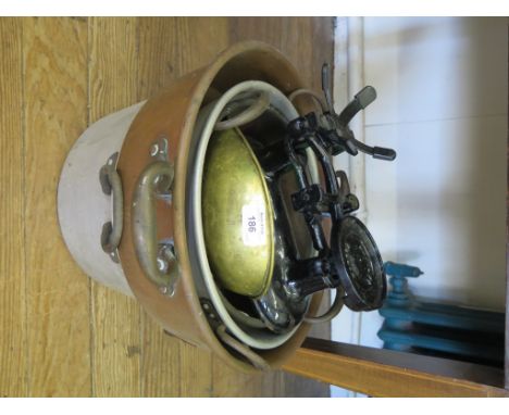 Two copper jam pans, 30.5cm and 49cm, two other preserve pans, and a set of kitchen scales